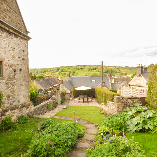 Holiday cottage amongst grassland hills